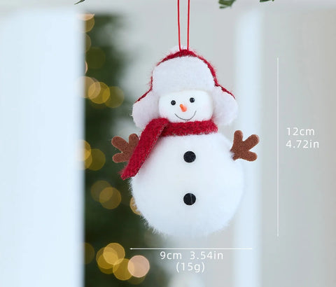 Liten hängande snögubbe i plysch