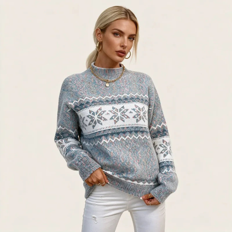Kvinna i gråblå stickad tröja med Fair Isle-band av snöflingor